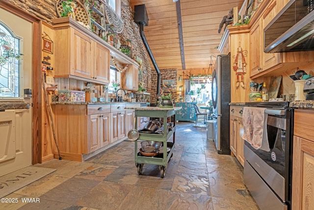3738 Apache Trl, Pine, AZ 85544 - kitchen with appliances with stainless steel finishes, stone tile floors, vaulted ceiling, wooden ceiling, and light stone counters