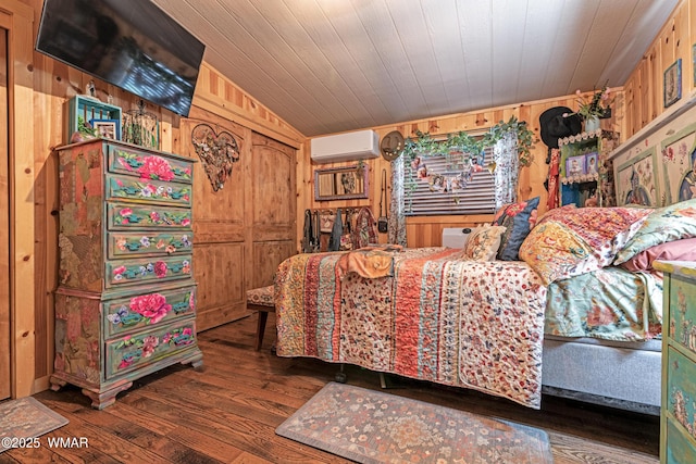 3738 Apache Trl, Pine, AZ 85544 - bedroom featuring a wall mounted air conditioner, wood walls, and wood-type flooring
