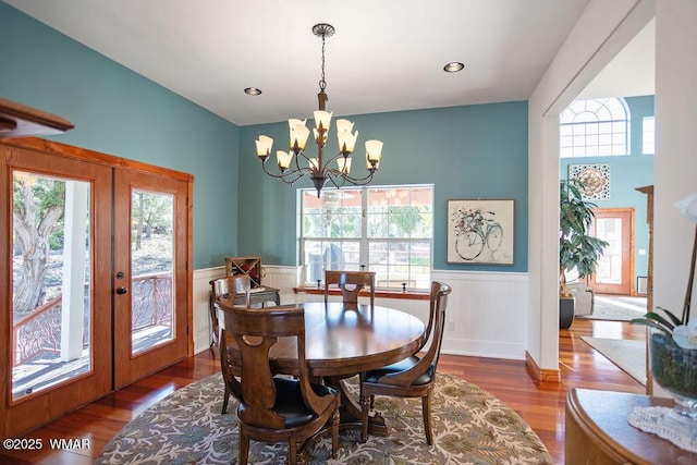 1961 S Canyon Ridge Trl, Show Low, AZ 85901 - dining room with a chandelier, wainscoting, healthy amount of natural light, and wood finished floors