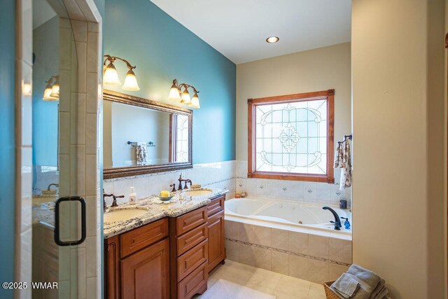 1961 S Canyon Ridge Trl, Show Low, AZ 85901 - full bathroom with a tub with jets, double vanity, a shower stall, and tile patterned flooring