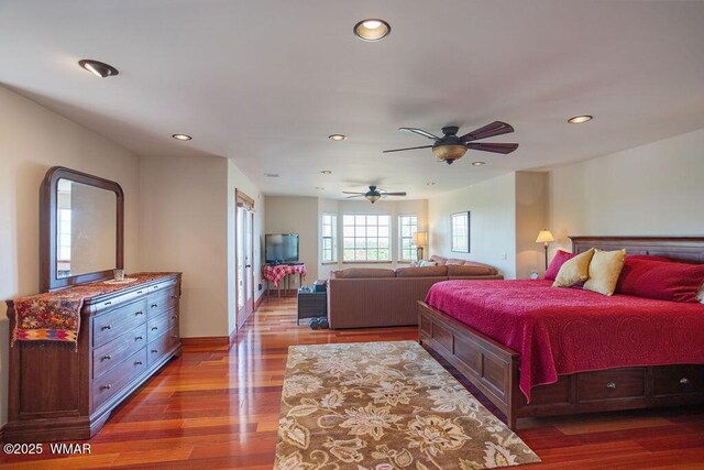 1961 S Canyon Ridge Trl, Show Low, AZ 85901 - bedroom with recessed lighting, wood finished floors, and baseboards