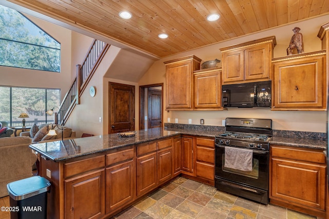 5621 E Starlight Ridge Rd, Lakeside, AZ 85929 - kitchen with black appliances, recessed lighting, wooden ceiling, a peninsula, and brown cabinetry