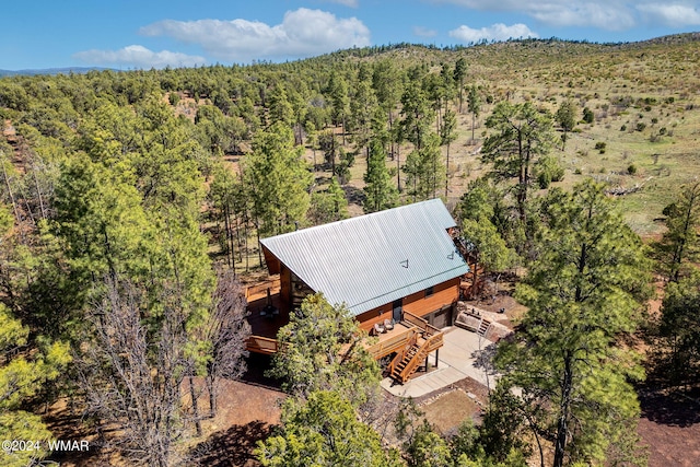 aerial view featuring a forest view