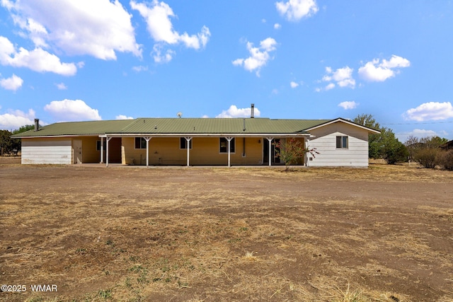 1720 E Becker Lane Loop, Springerville, AZ 85938 - ranch-style home featuring a metal roof