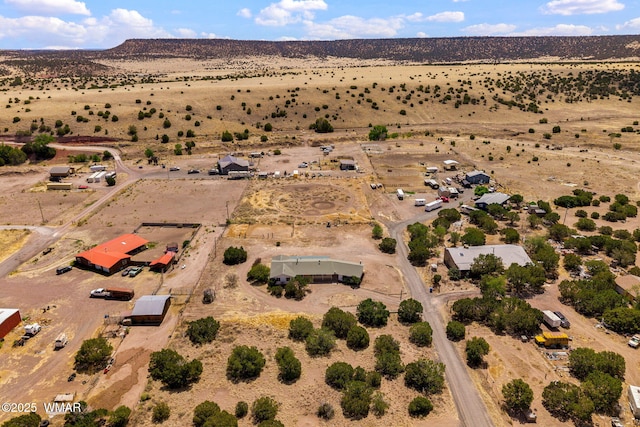 1720 E Becker Lane Loop, Springerville, AZ 85938 - aerial view of property and surrounding area featuring rural landscape and a mountain backdrop