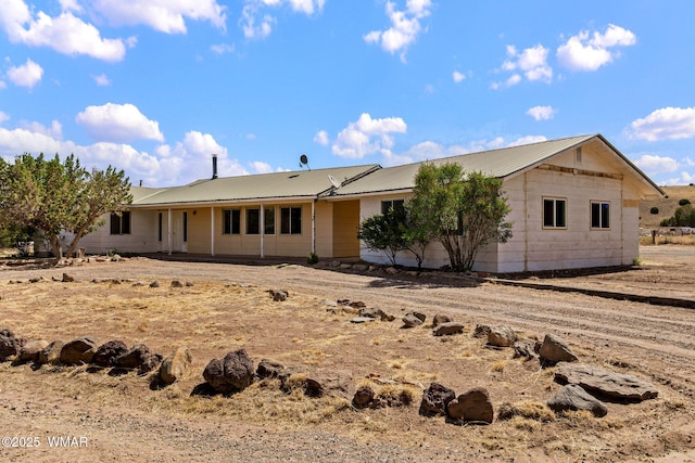 1720 E Becker Lane Loop, Springerville, AZ 85938 - view of front of house featuring a metal roof