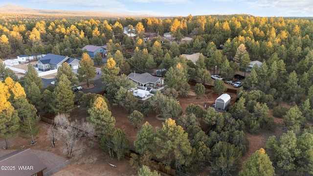 drone / aerial view with a view of trees