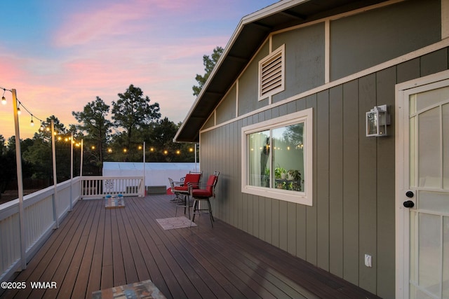 view of deck at dusk