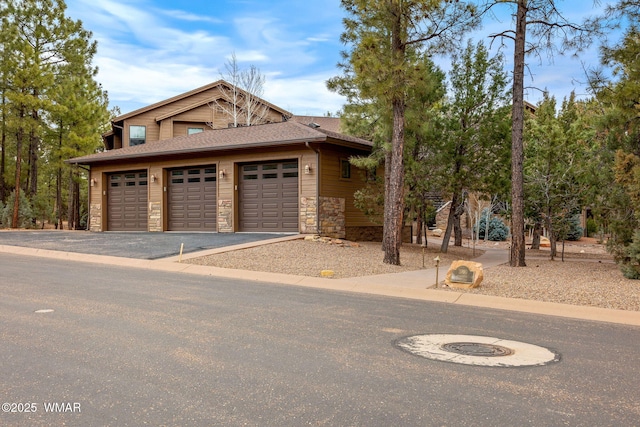 garage featuring driveway