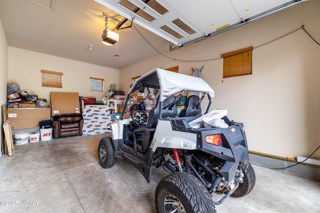 garage featuring a garage door opener