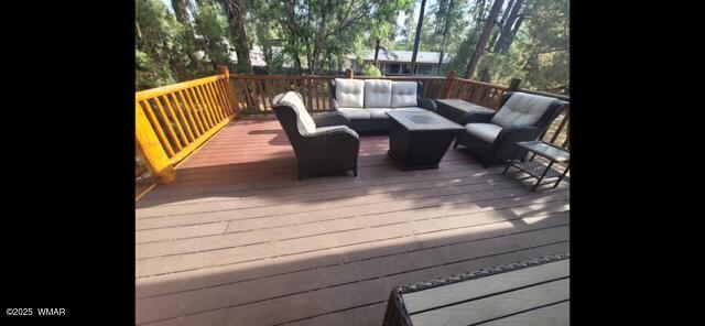 2930 W Lodgepole Ln, Show Low, AZ 85901 - wooden terrace featuring an outdoor living space