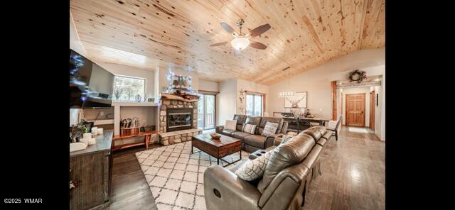 2930 W Lodgepole Ln, Show Low, AZ 85901 - living area with wood ceiling, a ceiling fan, plenty of natural light, wood finished floors, and a fireplace