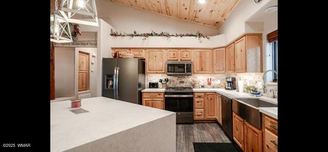2930 W Lodgepole Ln, Show Low, AZ 85901 - kitchen with stainless steel microwave, fridge with ice dispenser, gas stove, wood ceiling, and dishwasher