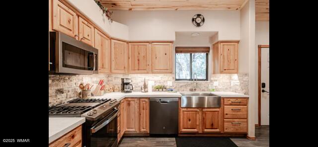 2930 W Lodgepole Ln, Show Low, AZ 85901 - kitchen featuring stainless steel appliances, a sink, light brown cabinetry, and light countertops