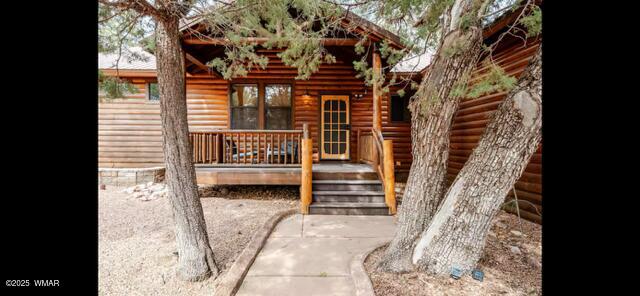 2930 W Lodgepole Ln, Show Low, AZ 85901 - entrance to property with log veneer siding