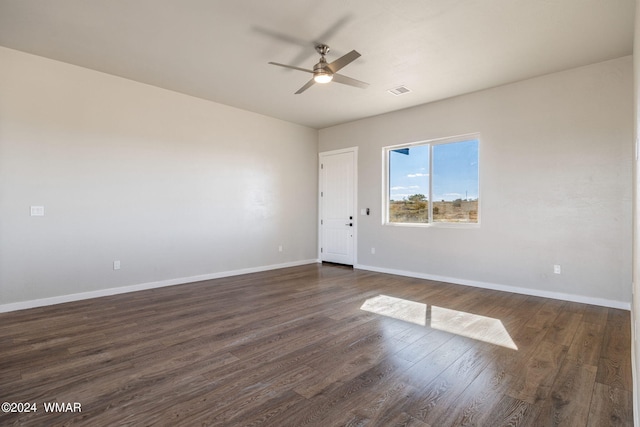 159 Willis St, Taylor, AZ 85939 - empty room featuring dark wood-type flooring, visible vents, ceiling fan, and baseboards