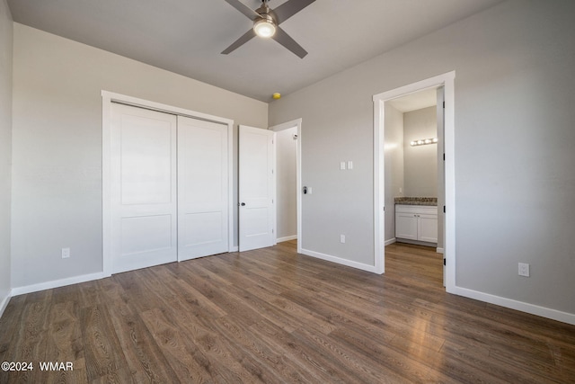 159 Willis St, Taylor, AZ 85939 - unfurnished bedroom with dark wood-type flooring, a closet, and baseboards