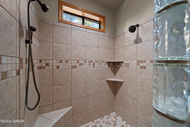 bathroom featuring tiled shower