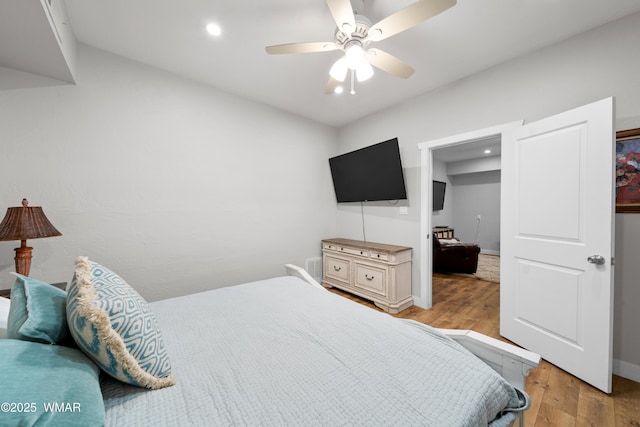 bedroom featuring recessed lighting, ceiling fan, and light wood-style floors