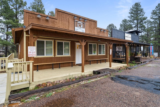 exterior space featuring a wooden deck