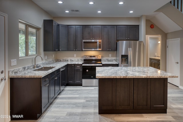 2362 Aspen Run, Pinetop, AZ 85935 - kitchen with light stone counters, visible vents, stainless steel appliances, and a sink