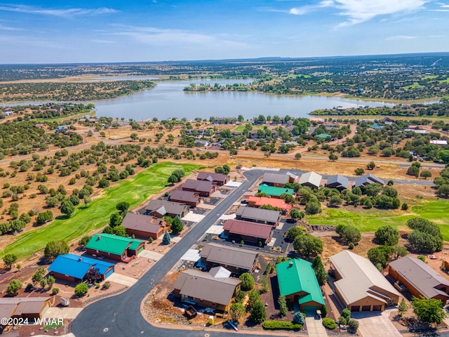 bird's eye view with a water view, a residential view, and golf course view