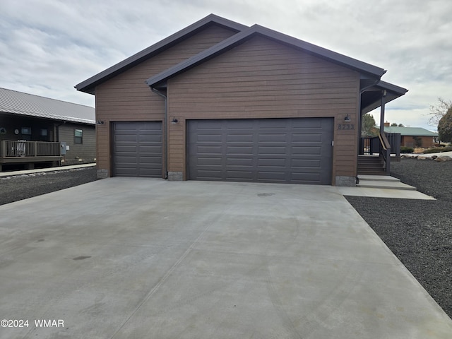 garage featuring driveway