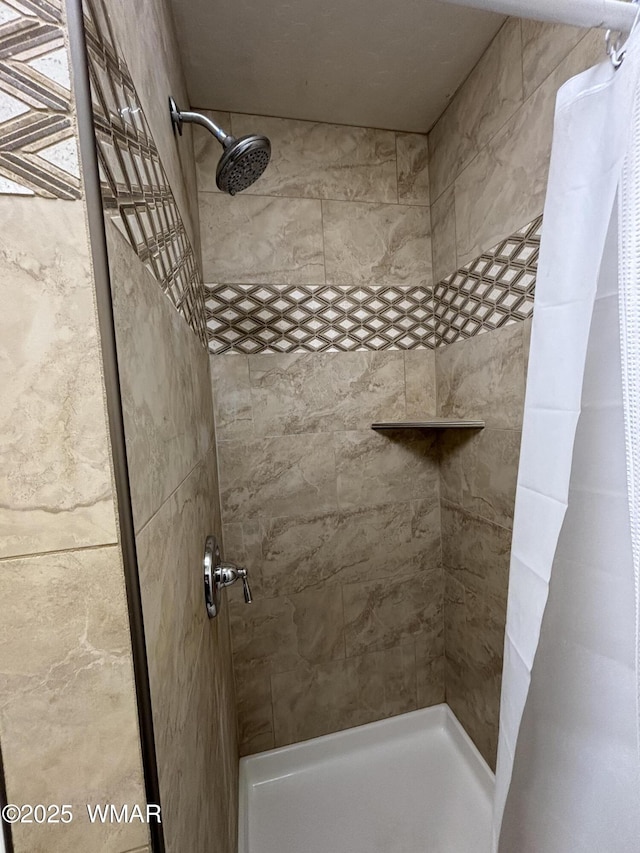 full bathroom featuring a stall shower