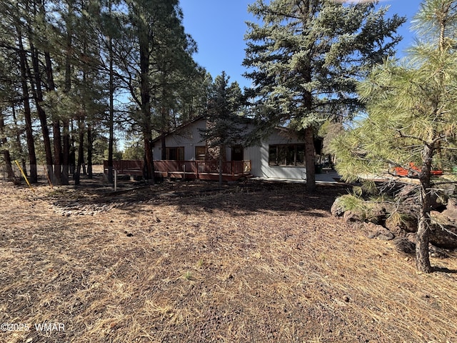 view of yard with a deck