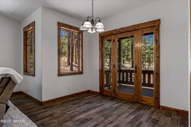 3 County Road 1058, Greer, AZ 85927 - entryway with dark wood-type flooring, baseboards, and a chandelier