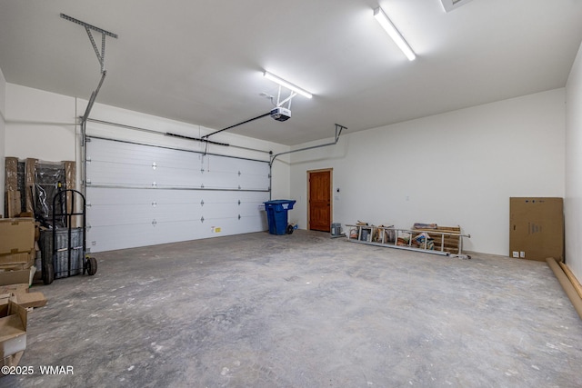 3 County Road 1058, Greer, AZ 85927 - garage featuring a garage door opener