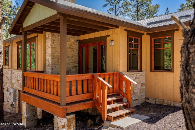 3 County Road 1058, Greer, AZ 85927 - doorway to property with metal roof and stone siding