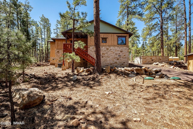 3 County Road 1058, Greer, AZ 85927 - view of side of property featuring stairs and stone siding