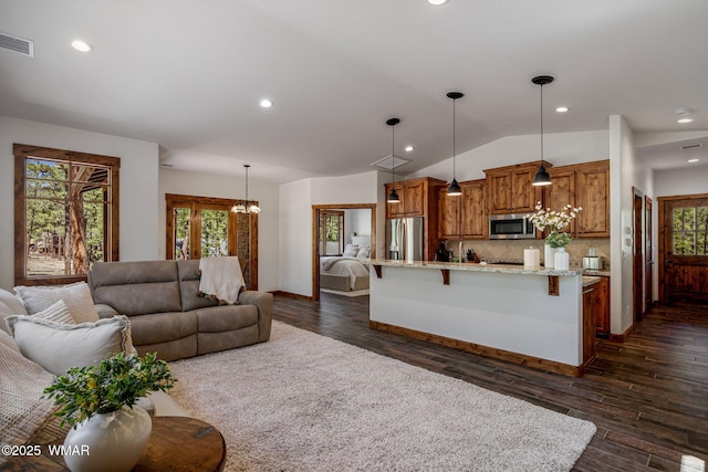 3 County Road 1058, Greer, AZ 85927 - living area with recessed lighting, lofted ceiling, a chandelier, dark wood finished floors, and baseboards