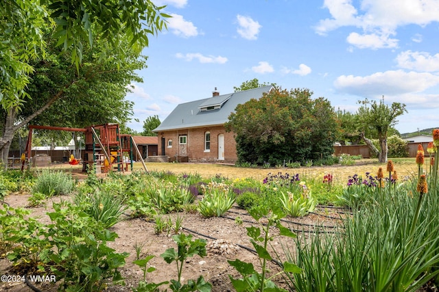 view of yard featuring a playground