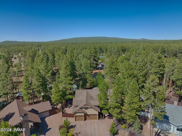 bird's eye view featuring a forest view