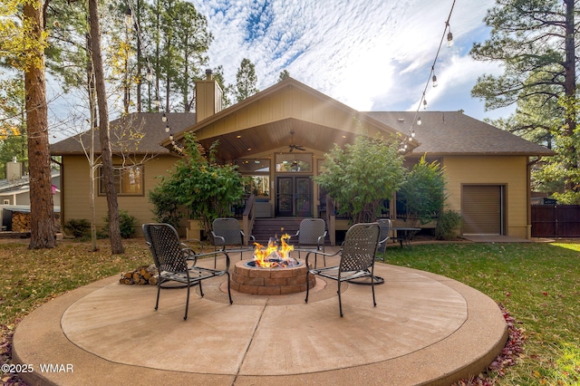 view of patio featuring an outdoor fire pit and ceiling fan