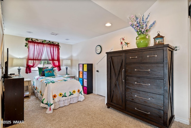 bedroom with recessed lighting and light colored carpet