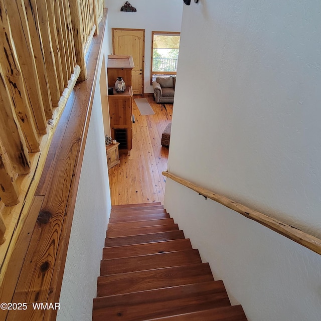 822 E 1st Ln, Eagar, AZ 85925 - stairway with wood-type flooring and a textured wall