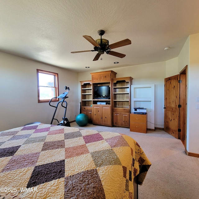 822 E 1st Ln, Eagar, AZ 85925 - bedroom featuring light colored carpet, baseboards, and ceiling fan