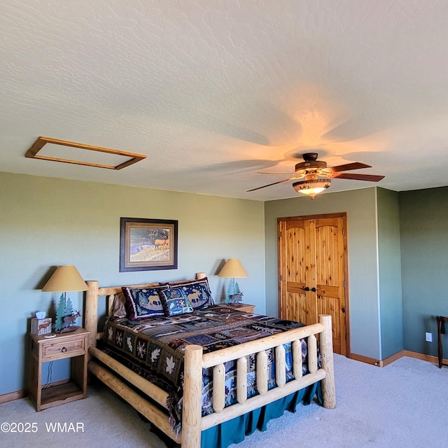 822 E 1st Ln, Eagar, AZ 85925 - bedroom with carpet flooring, baseboards, and ceiling fan