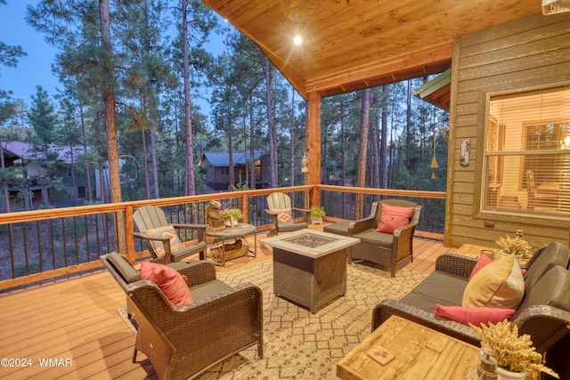 sunroom / solarium featuring vaulted ceiling and wooden ceiling