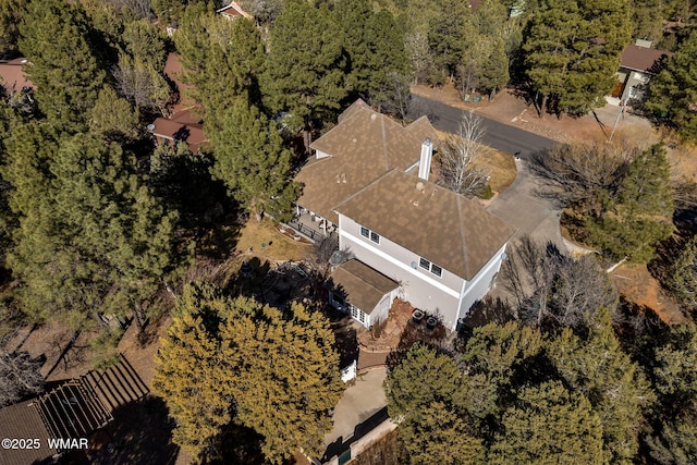 bird's eye view featuring a view of trees