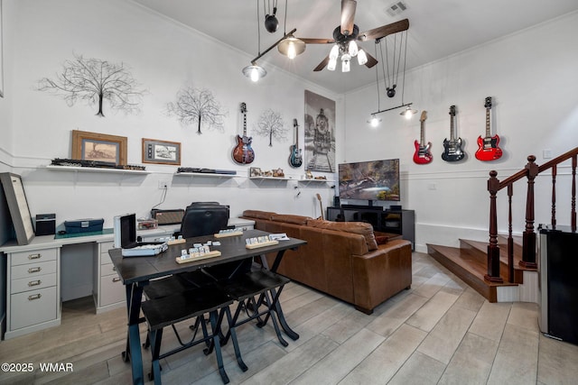 home office featuring ceiling fan, visible vents, crown molding, and wood finish floors