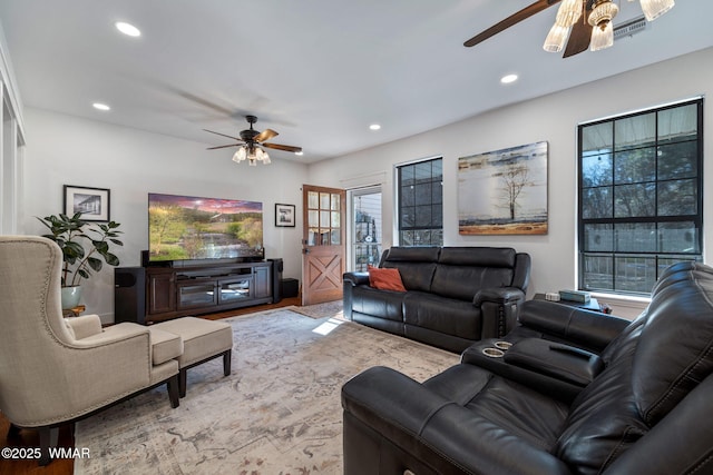 living room with ceiling fan, wood finished floors, and recessed lighting