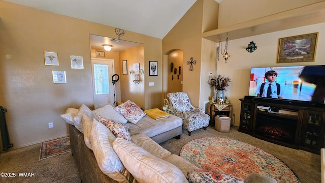 860 N Kiaya Ln, Show Low, AZ 85901 - living area featuring carpet flooring, arched walkways, and high vaulted ceiling