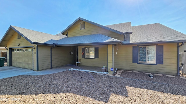 860 N Kiaya Ln, Show Low, AZ 85901 - view of front of home with a garage, a shingled roof, and driveway