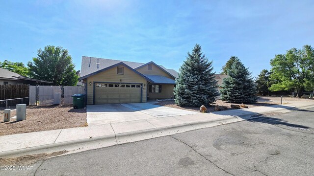 860 N Kiaya Ln, Show Low, AZ 85901 - view of front of property featuring driveway and an attached garage
