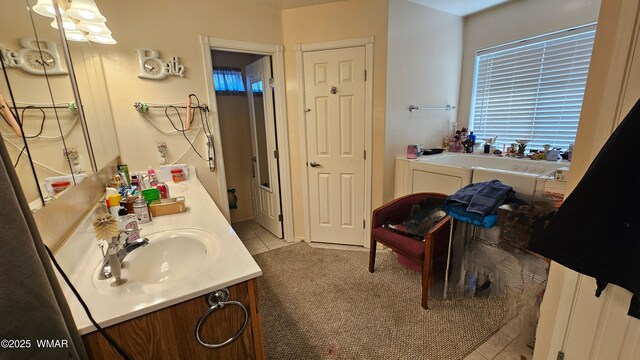 860 N Kiaya Ln, Show Low, AZ 85901 - bathroom featuring double vanity, a garden tub, and tile patterned flooring