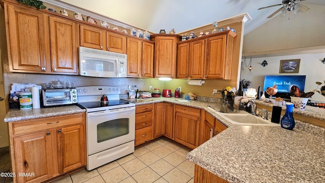 860 N Kiaya Ln, Show Low, AZ 85901 - kitchen with white appliances, light tile patterned flooring, ceiling fan, brown cabinets, and light countertops